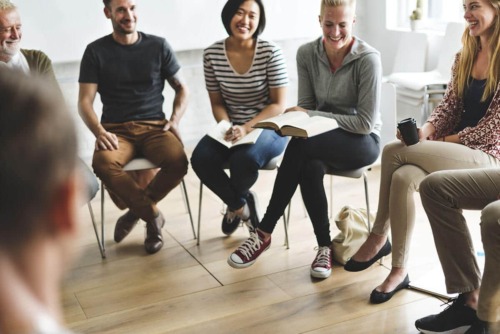 12 steps circle of people in a 12 steps recovery program