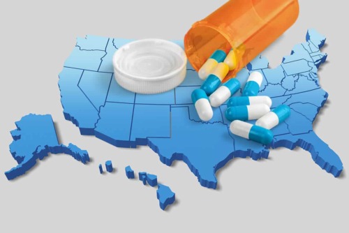 Opioid Epidemic Map of the US and with pills scattered on it showing the Opioid Epidemic