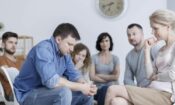 man in therapy circle knows what is rehab like