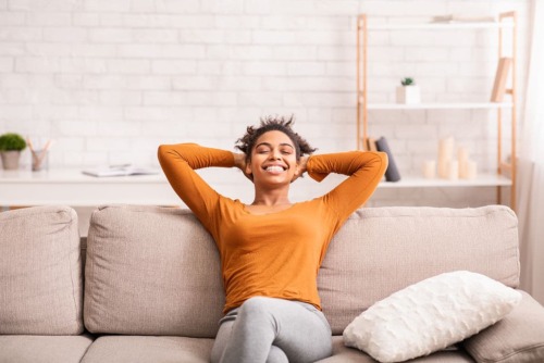 woman kicking back relaxing because she knows how to accept yourself