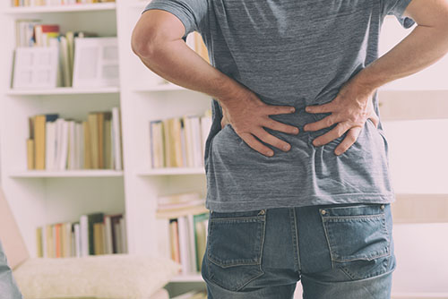 a man in need of back pain management