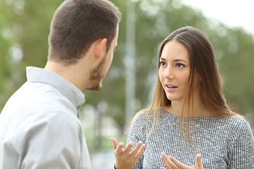 Man and woman having emotional discussion following dialectical behavior therapy DBT