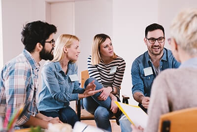 group participates in life skills training during addiction treatment