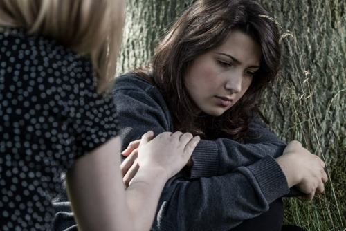 psychological dependence woman ponders psychological dependence to drugs and alcohol during addiction treatment