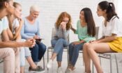 a group therapy session discussing their experiences at rehab center in Texas