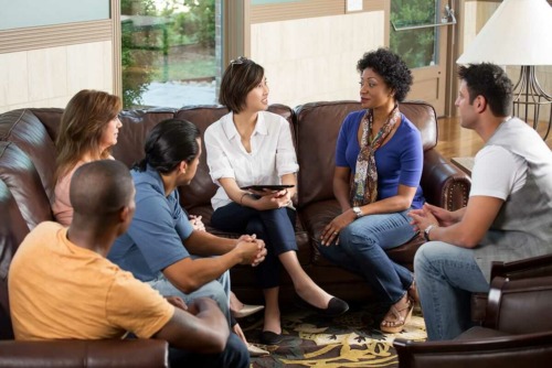 a support groups discussing rehab experiences