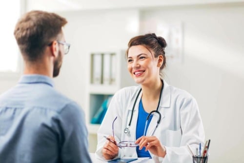 doctor answering man's question about what is neurofeedback therapy