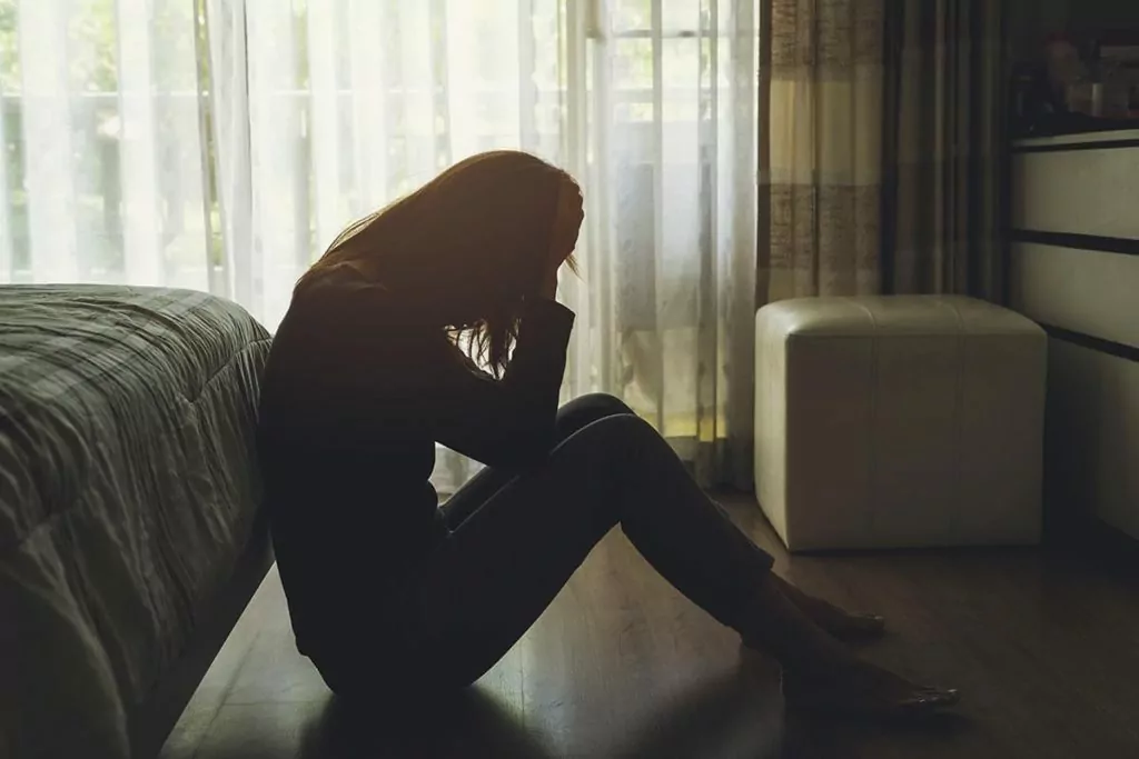 woman struggling with alcohol addiction