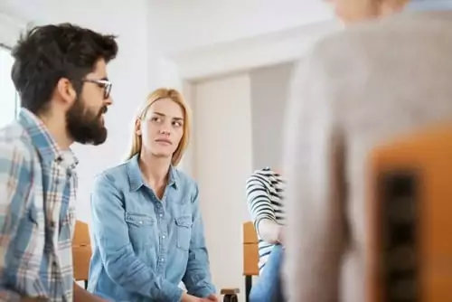 Patient sitting a group in a Galveston drug rehab