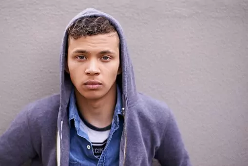 Man wearing a hoodie outside