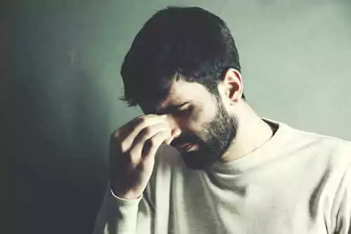 Man, struggling with occurring disorders and addiction addict
