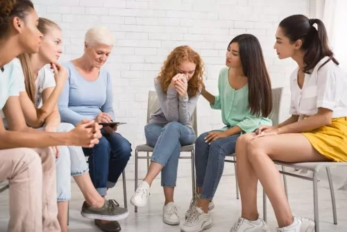 Group of patients sitting in rehab center in Texas