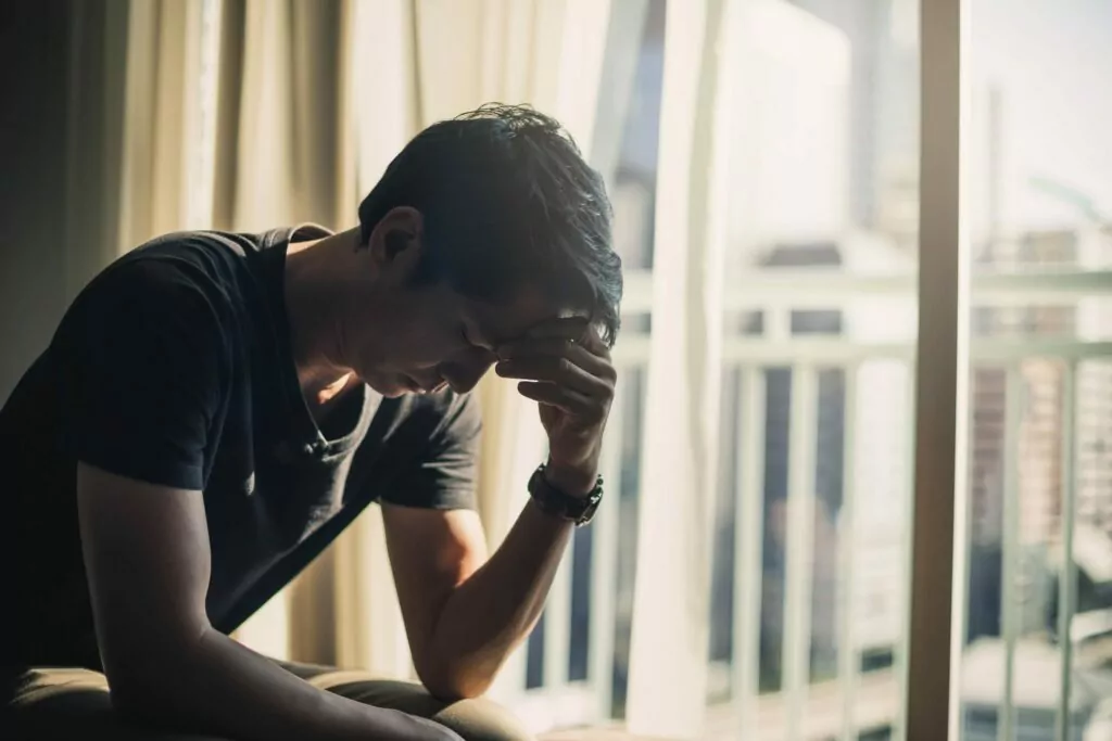 man experiences alcohol withdrawal symptoms