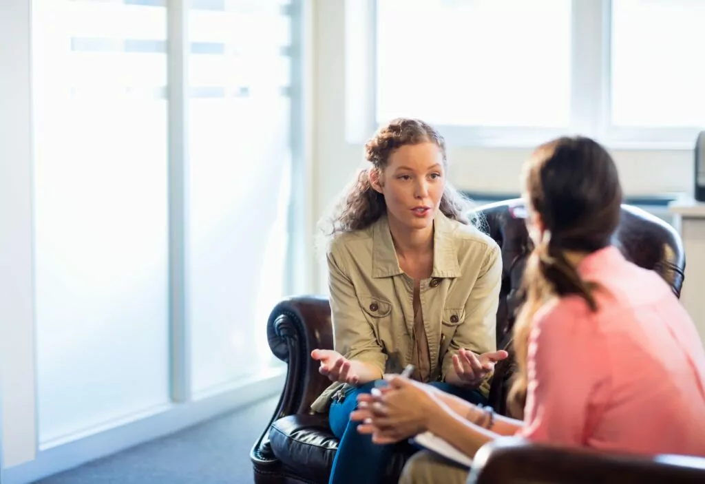 A woman in therapy during benzodiazepine detox in Houston.